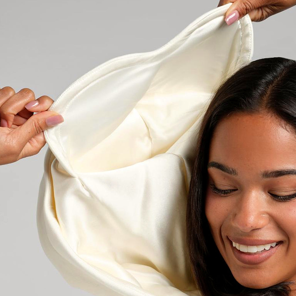 Satin-lined hood pulled over, ivory