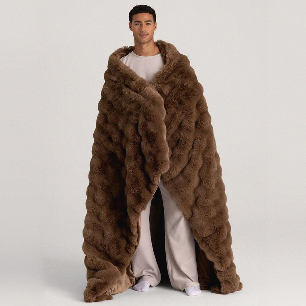 Mochi Mellow Cloud Heated Lavender Throw in Mocha — Mocha heated lavender throw wrapped around a man's shoulders, trailing to the floor