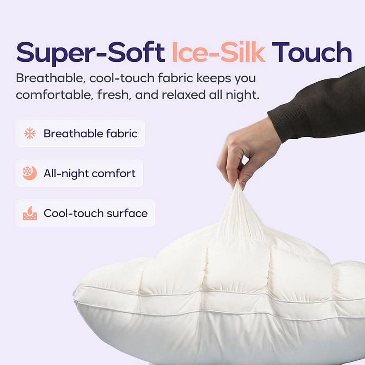 Hand pinching the super-soft ice-silk cool-touch pillow surface