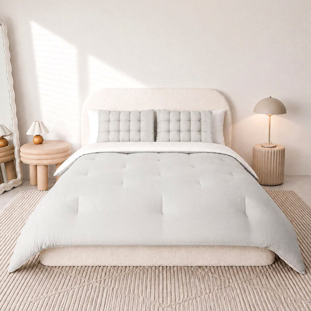 Mochi Mellow Cloud comforter in Silver on a made bed