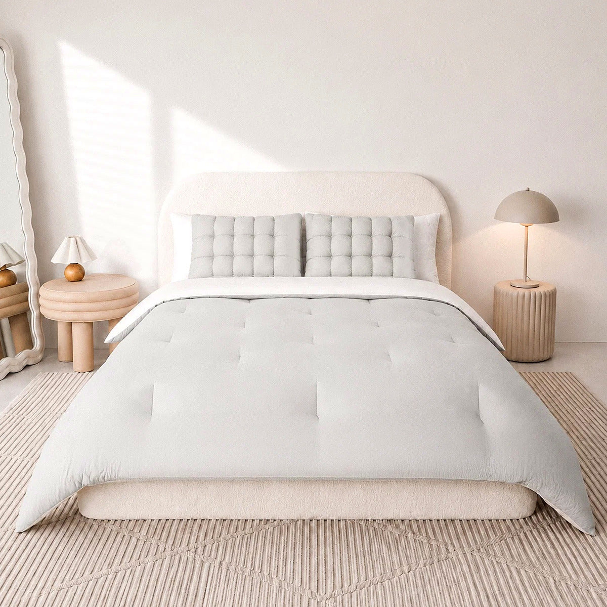 Mochi Mellow Cloud comforter in Silver on a made bed