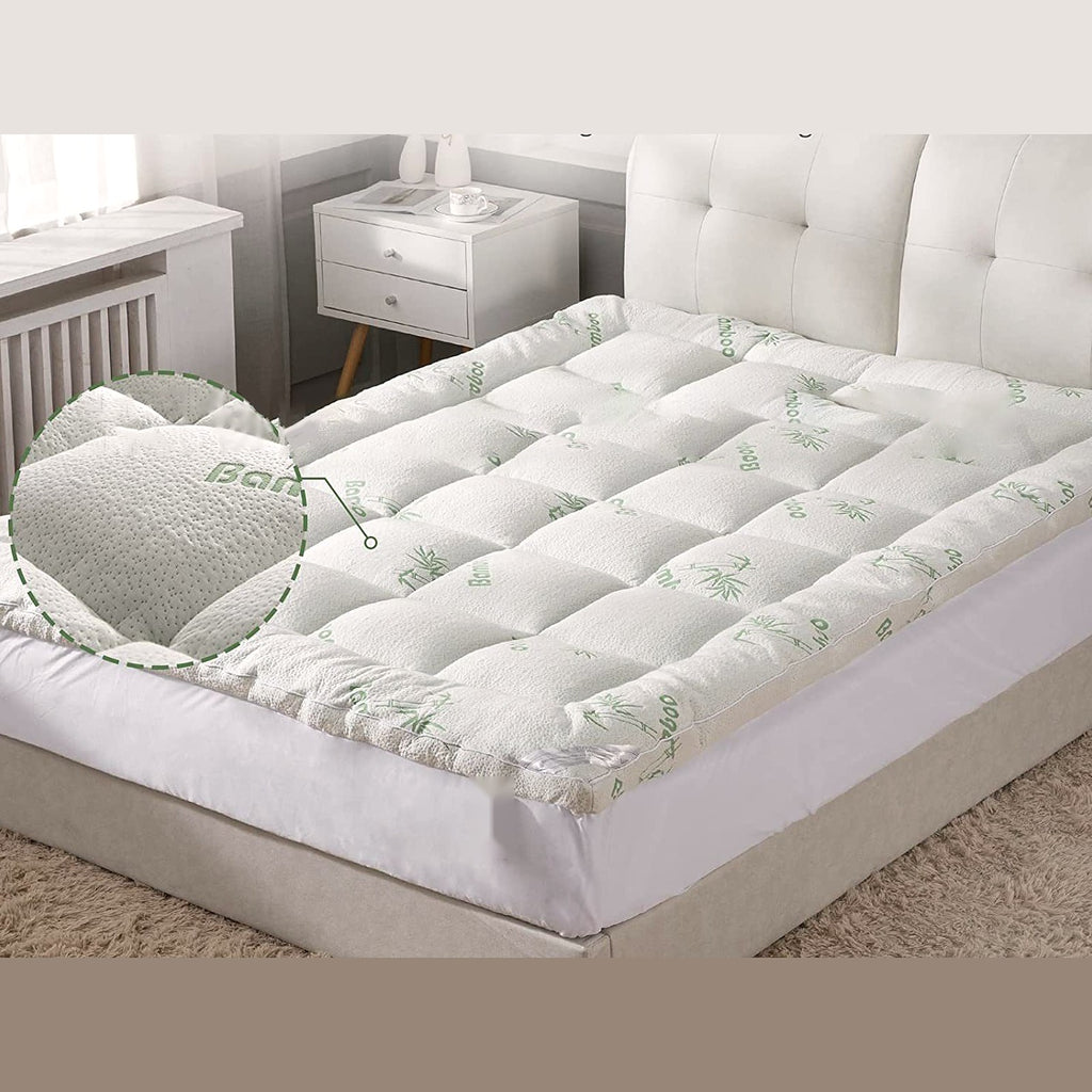Bamboo Cooling Mattress Topper in White/Grey on a queen bed, with a close-up of the bamboo-viscose knit
