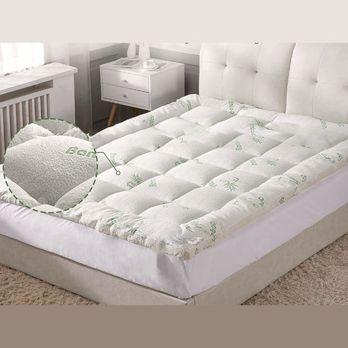 Bamboo Cooling Mattress Topper in White/Grey on a queen bed, with a close-up of the bamboo-viscose knit