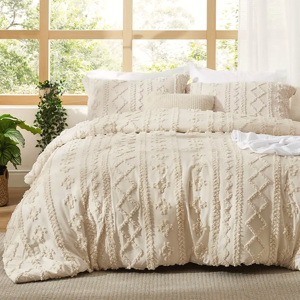 Mochi Mellow Cloud Tufted Comforter Set in Cream on a made bed, with the two matching tufted pillow shams