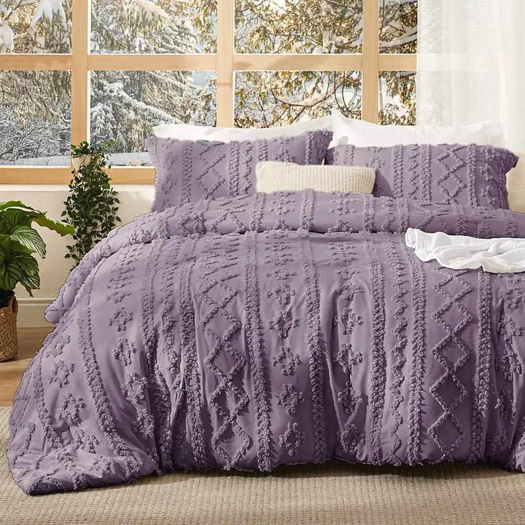 Mochi Mellow Cloud Tufted Comforter Set in Lavender on a made bed, with the two matching tufted pillow shams