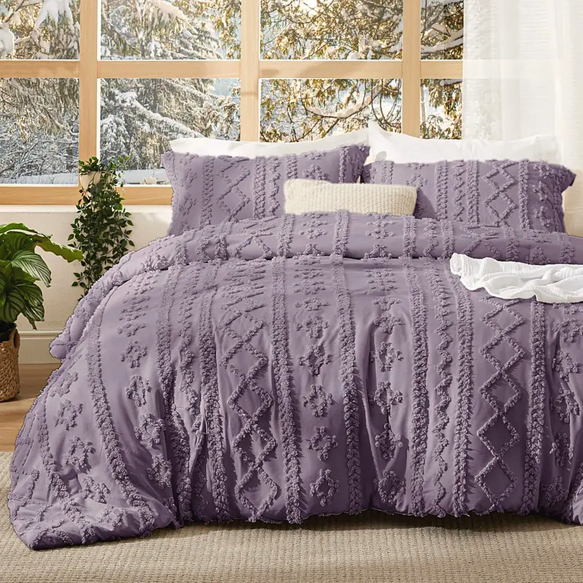 Mochi Mellow Cloud Tufted Comforter Set in Lavender on a made bed, with the two matching tufted pillow shams
