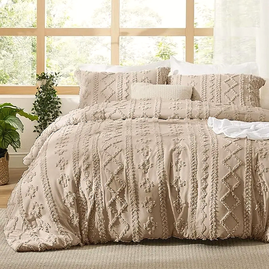 Mochi Mellow Cloud Tufted Comforter Set in Taupe on a made bed, with the two matching tufted pillow shams